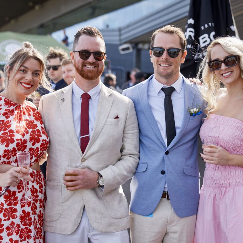 a group of people posing for the camera